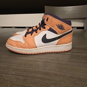 Nike Air Jordan Mid in Orange, White, and Black